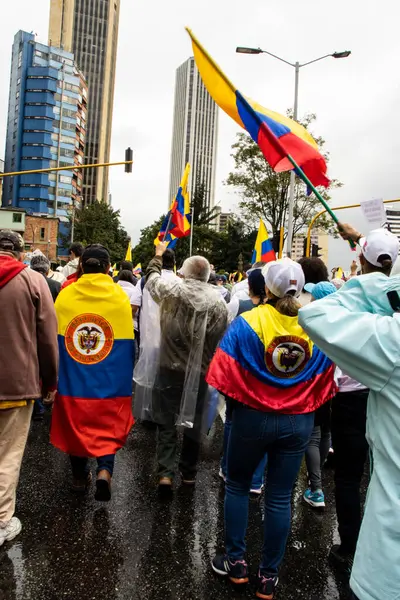 Stock image BOGOTA, COLOMBIA - 21 April 2024. March asking for Gustavo Petro impeachment. Peaceful protest march in Bogota Colombia against the law reforms of Gustavo Petro government.