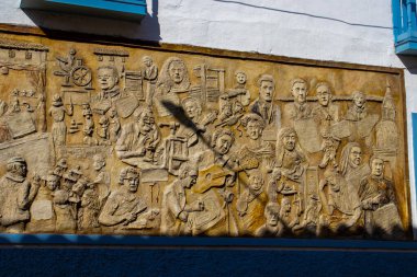 SALAMINA, COLOMBIA - JANUARY 14, 2024:  Beautiful mural by Fernando Toro Ceballos at the heritage town of Salamina located at the Caldas department in Colombia. clipart