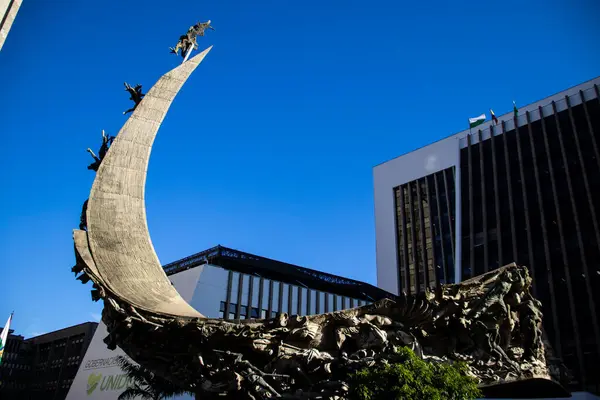 stock image Medellin, Colombia - January 18, 2024: Antioquia Government building and the Monument to the Race by Rodrigo Arenas Betancourt at La Alpujarra administrative center in Medellin