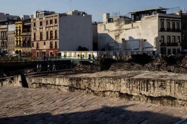 Mexico City, Mexico  November 12, 2024: View of the Templo Mayor Museum excavation site and the streets of the Mexico City downtown. clipart