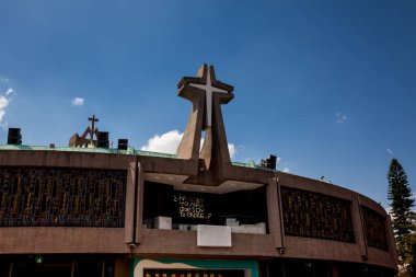 Mexico City, Mexico - September 16, 2024: Detail of the facade of the new Basilica of the Virgin of Guadalupe. clipart