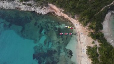 Aerial view of Porto Timoni beach during the sunset in Corfu Island, Greece.