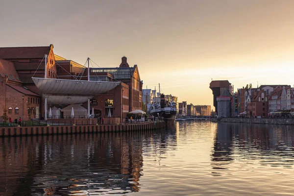 Gdansk, Poland - 1 November, 2022: Motlawa river and beautiful cityscape at dusk