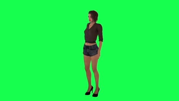 一个穿着棕色连衣裙 黑色短裤和高跟鞋的女人在绿色的屏幕上从直角向她的朋友挥手致意 — 图库视频影像