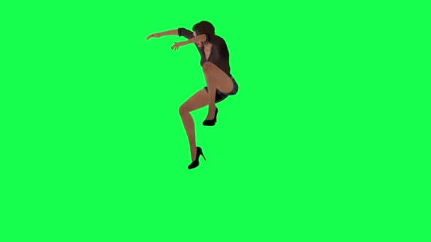 一位穿着棕色连衣裙和黑色短裤的年轻女子在绿色的屏幕上从一个直角跳到空中 — 图库视频影像