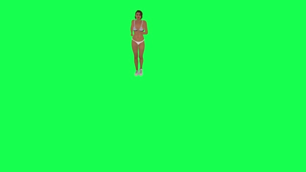 穿着鞋子和白色比基尼的年轻女子在绿色屏幕上跑步和锻炼前视 — 图库视频影像