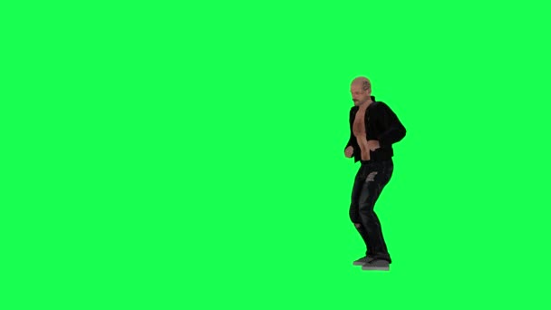 Wysoki Mężczyzna Zielonym Ekranie Kurtką Czarnymi Spodniami Odkrywający Tosi Podartymi — Wideo stockowe