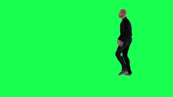 Przystojny Mężczyzna Zielonym Ekranie Kurtką Czarnymi Spodniami Kashf Tosi Rozdartymi — Wideo stockowe