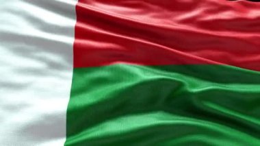 Madagaskar bayrağının rüzgarda dalgalanan 4k görüntüsü. Madagaskar Bayrak Dalgası Döngüsü rüzgarda dalgalanıyor. Gerçekçi Madagaskar Bayrağı geçmişi. Madagaskar Bayrak Döngüsü Kapanışı