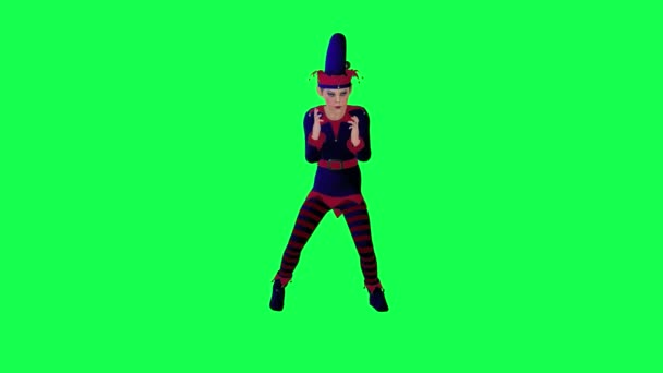 新年小精灵身穿红蓝衣服 在绿屏3D上从前角跳鸡舞 人们走在背景彩绘的关键视觉效果动画上 — 图库视频影像