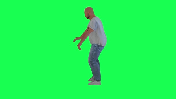 Ein Mann Mit Einem Pausbäckigen Athletischen Körper Grünem Schirm Mit — Stockvideo