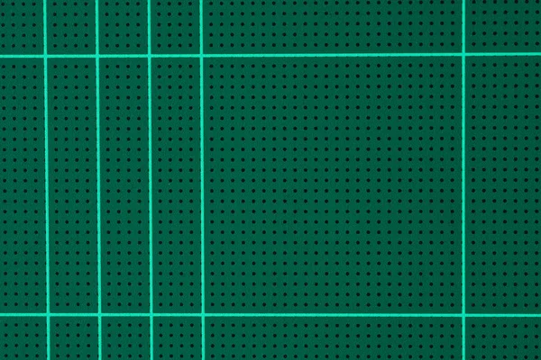 Kılavuz çizgisi kare şekilli kauçuk yeşil hasıraltı sayfası. Kağıt araçları, okul veya grafik sanatları stüdyo ekipmanları için arka plan tasarımı fikri..