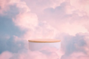 Surreal podium outdoor on blue sky pink gold pastel soft clouds with space.Beauty cosmetic product placement pedestal present promotion minimal display,summer paradise dreamy concept