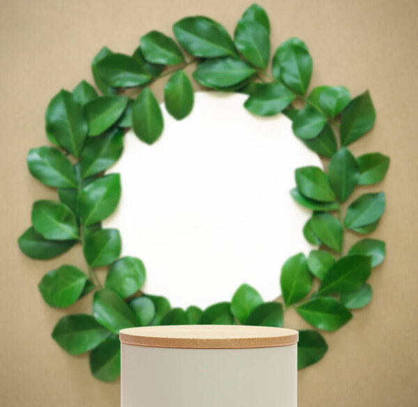 Minimal podium table top floor blurred white circle green leaf beige background.Organic herbal healthy natural product placement pedestal stand display,tropical nature forest jungle concept