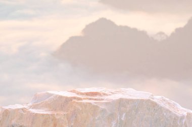 empty natural rough beige granite stone podium on white background with blank space.cosmetic beauty fashion product present placement pedestal promotion display,mock up minimal concept.