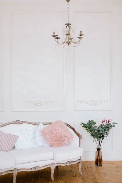 Beautiful sofa in white loft interior