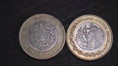 10 Mexican pesos coins from both sides, ready to use