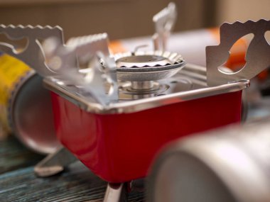 Atmospheric composition about tourism and survival with autonomous gas and gasoline cooking Portable gas and gasoline burners for tourism and survival, gas cylinders for them