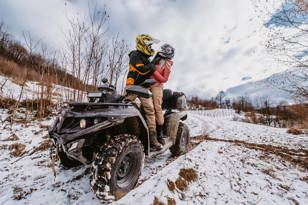 Couple Enjoying While Driving Quad Bike Top Mountain Winter Time — Stock Photo, Image
