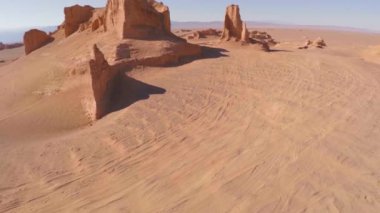 Cinematic aerial top view of Kalut Shahdad desert rock formation, Iran. High quality 4k footage