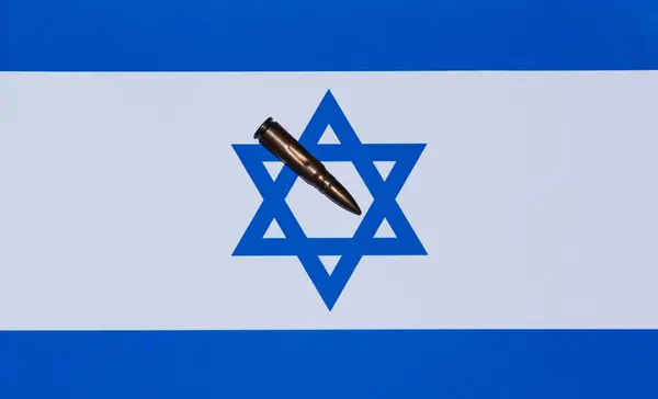 An Israeli flag that has a bullet on it, and is ready to defend itself against war, stop war. High quality photo