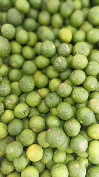 lime fruit background , pile of green lime fruits