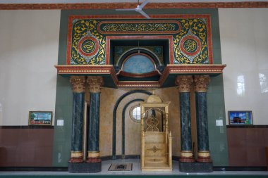 Some mosque interiors such as sermon chairs, roofs, red carpets and various kinds of very beautiful interiors in the Jami Baitul Kudus mosque, Bogor, Indonesia.