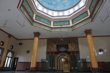 Some mosque interiors such as sermon chairs, roofs, red carpets and various kinds of very beautiful interiors in the Jami Baitul Kudus mosque, Bogor, Indonesia.