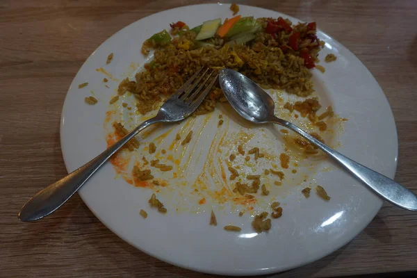 The empty dish after food. Leftover food on plate.