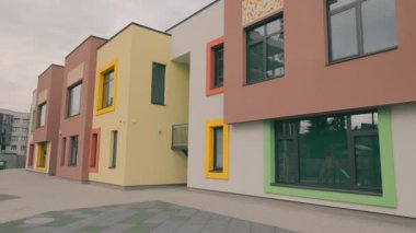 The facade of a modern colored kindergarten.