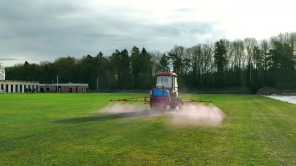 Tractor Sprinkles Grass Football Field Maintenance New Soccer Field Grass — 图库视频影像