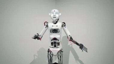Ellerini hareket ettiren bir araştırma laboratuvarındaki insansı robot. Yapay Zeka