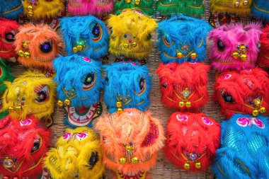 Lion dance show in chinese new year festival (Tet festival ), lion dance head decoration at wall