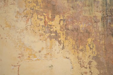 Texture of old gray concrete wall for background. Rough texture on gray wall rough form due to peeling paint layer due to rain