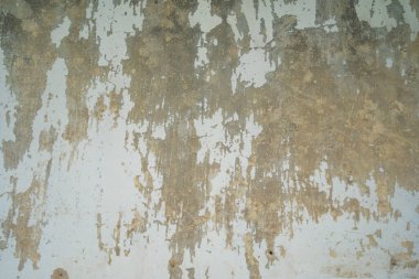 Texture of old gray concrete wall for background. Rough texture on gray wall rough form due to peeling paint layer due to rain