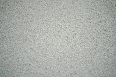 Blank concrete wall white, gray color for texture background. New surface looks rough. Wallpaper shape. Backdrop texture wall and have copy space for text. Painted cement Surface design banners