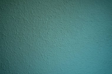 Blank concrete wall Green color for texture background. New surface looks rough. Wallpaper shape. Backdrop texture wall and have copy space for text. Painted cement Surface design banners