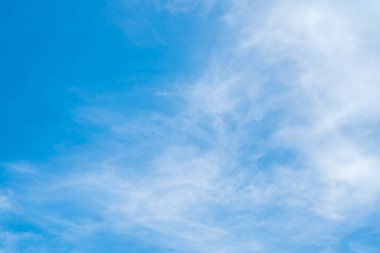 Beautiful view of blue sky with clouds at sunrise. Partly cloudy.Background cloud summer. Cloud summer. Sky cloud clear with sunset. Natural sky cinematic beautiful yellow and white texture background