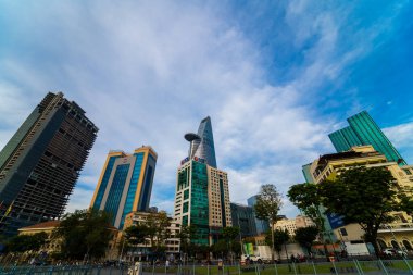 Ho Chi Minh City, VIETNAM - FEB 12 2022: Bitexco Financial Tower, skyscraper viewed from below toward a sky. Urban development with modern architecture