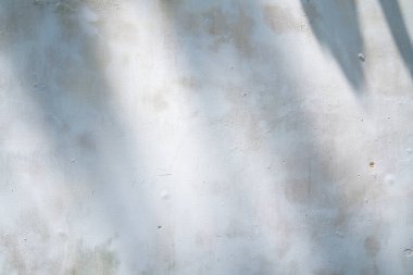 Texture of old gray concrete wall for background. . Rough texture on gray wall rough form due to peeling paint layer due to rain.