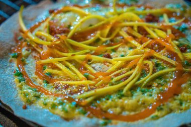 Close up Grilled girdle cake (Banh Trang Nuong) , a famous Vietnamese street stall eatery, a popular Vietnamese food in Da lat at night