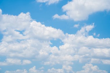 Beautiful view of blue sky with clouds at sunrise. Partly cloudy.Background cloud summer. Cloud summer. Sky cloud clear with sunset. Natural sky cinematic beautiful yellow and white texture background