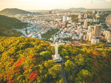 Top view of Vung Tau with statue of Jesus Christ on Mountain . the most popular local place. Christ the King, a statue of Jesus. Travel concept.