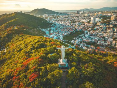 Top view of Vung Tau with statue of Jesus Christ on Mountain . the most popular local place. Christ the King, a statue of Jesus. Travel concept.