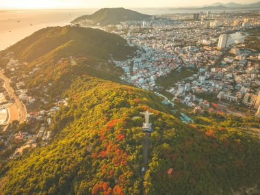 Top view of Vung Tau with statue of Jesus Christ on Mountain . the most popular local place. Christ the King, a statue of Jesus. Travel concept.
