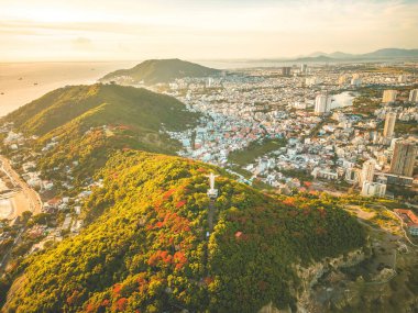 Top view of Vung Tau with statue of Jesus Christ on Mountain . the most popular local place. Christ the King, a statue of Jesus. Travel concept.