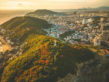 Top view of Vung Tau with statue of Jesus Christ on Mountain . the most popular local place. Christ the King, a statue of Jesus. Travel concept.