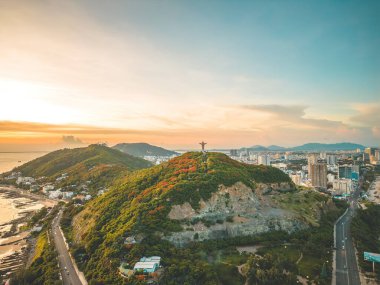 Top view of Vung Tau with statue of Jesus Christ on Mountain . the most popular local place. Christ the King, a statue of Jesus. Travel concept.
