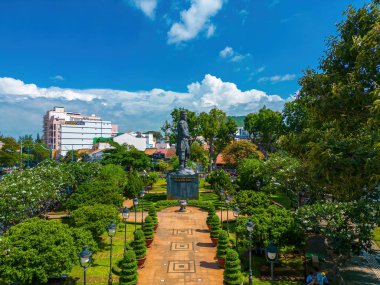 VUNG TAU - JULY 2 2022: Tran Hung Dao statue in Vung Tau city in Vietnam. Monument of the military leader on blue sky background