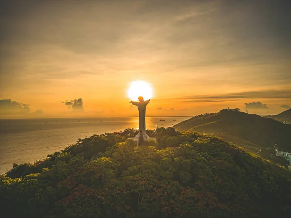 Top view of Vung Tau with silhouette statue of Jesus Christ on Mountain . the most popular local place. Christ the King, a statue of Jesus. Travel concept.
